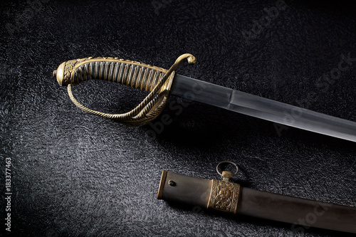 An ancient saber with a beautiful handle.