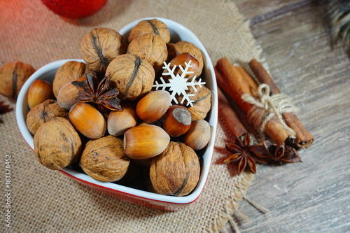 Nuts and spices.Christmas time. At the holiday table 