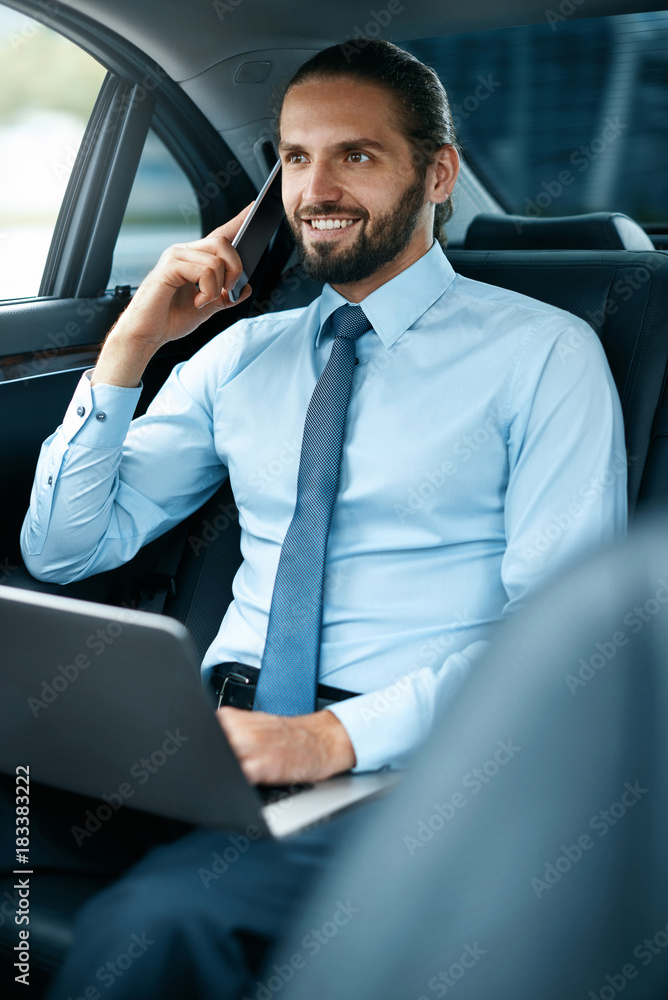 Business Man In Car Calling On Phone While Going To Work