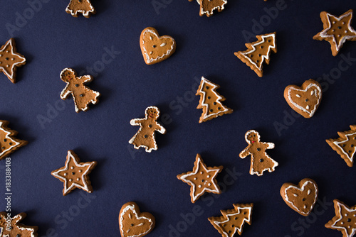 Brown gingerbreads on blue background
