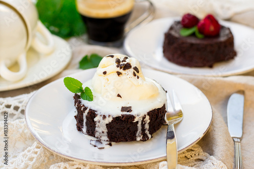 Molten chocolate cake fondant with vanilla ice cream for dessert