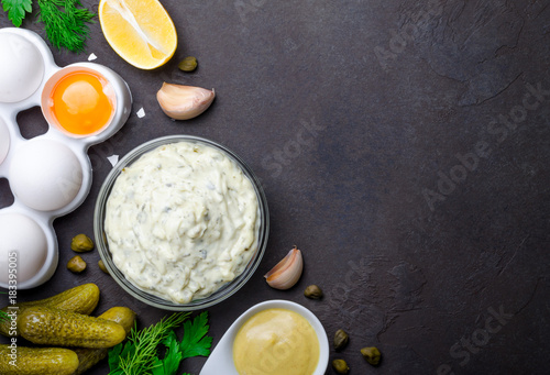 White sauce tartar tartare with ingredients pickles, capers, dil