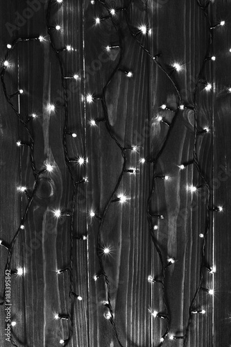 Christmas lights black and white effect background.