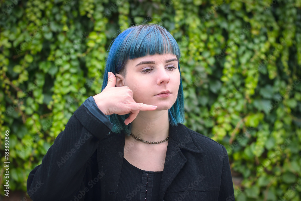 attractive blue hair girl gesturing with fingers call me attractive blue hair girl gesturing with fingers call me