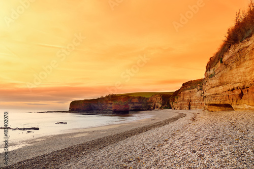 Impressive red sandstones of the Ladram bay on the Jurassic coast  a World Heritage Site on the English Channel coast of southern England  Devon