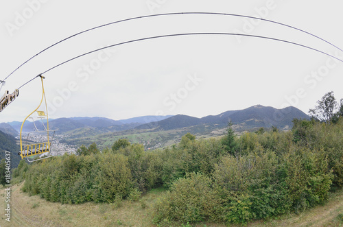 The cable car system on the background of Mount Makovitsa, one of the Carpathian Mountains photo