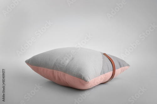 Soft pillow on light background