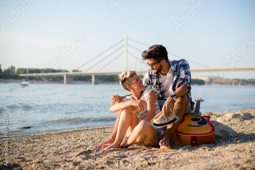 Young hipster couple on a beach © Jovan