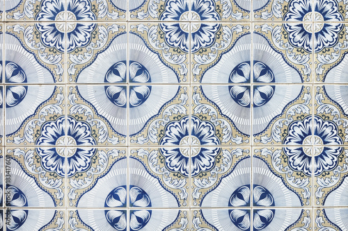 Typical Portuguese decorations on a wall with colored ceramic tiles. Traditional mosaic tiles Azulejos.