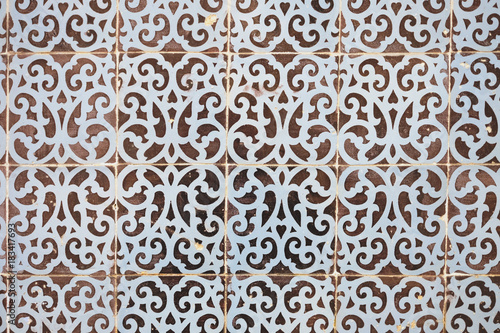 Typical Portuguese decorations on a wall with colored ceramic tiles. Traditional mosaic tiles Azulejos.