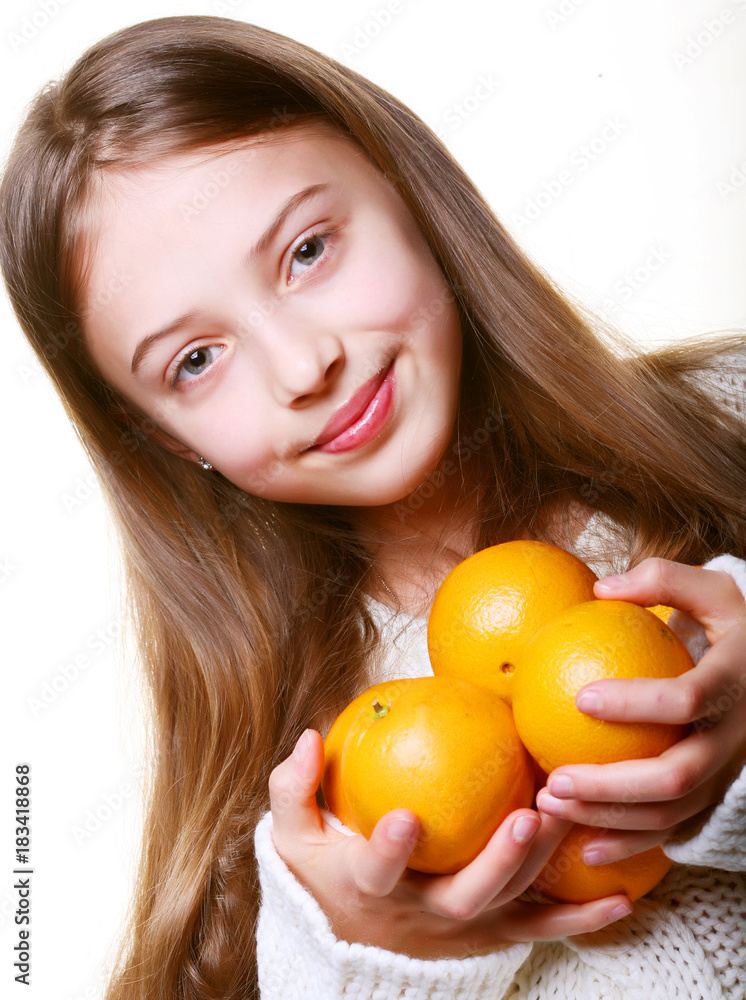 Happy little girl with oranges Happy little girl with oranges