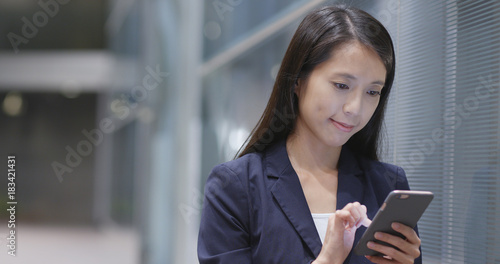 Businesswoman use of smart phone