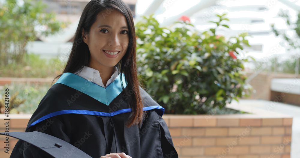 Young asian woman graduated from university