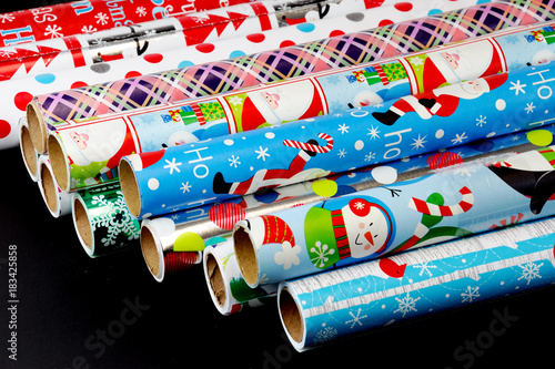 colorful wrapping paper isolated on black background