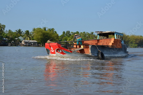 Can Tho, Vietnam. The boat laden with bricks on the Mekong river