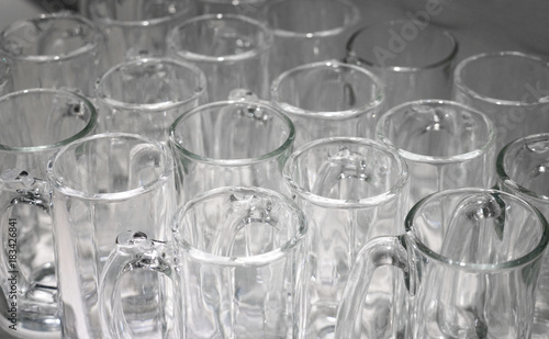 Close up on glass cups prepared for the party