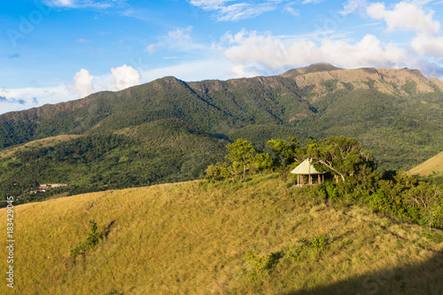 small wooden house in the green hill near Coron City view point