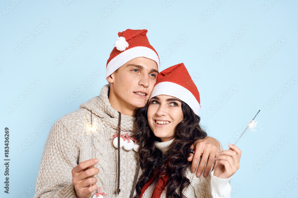 2083657 man and woman embrace and hold Bengal lights, couple, new year, holiday, christmas, emotions 2083657 man and woman embrace and hold Bengal lights, couple, new year, holiday, christmas, emotions