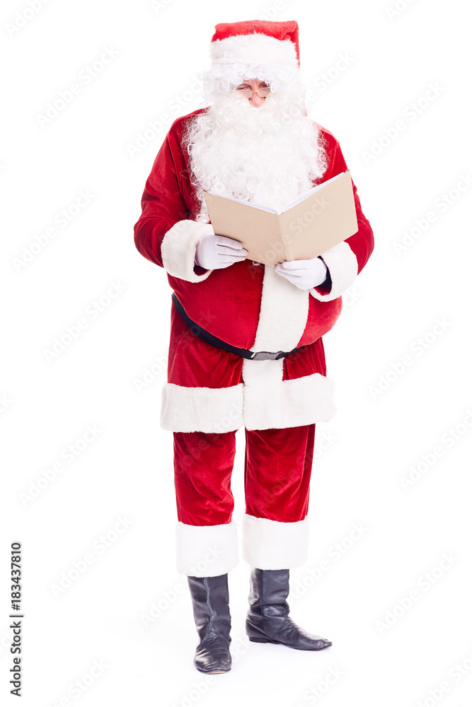 Christmas character Santa Claus holding book with blank cover Christmas character Santa Claus holding book with blank cover