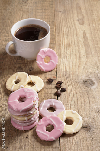 Cookies with icing and coffee
