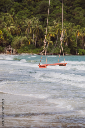 Swings hanged on the palm in Sao beach Vietnam