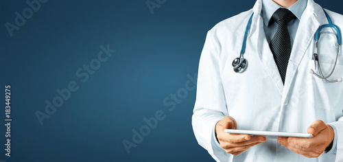 Obraz na plátne Doctor using digital tablet, modern technology in medicine and healthcare concep