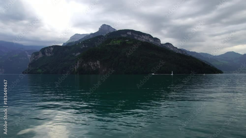 View of lake Lucerne with Swiss Alps green mountains in Luzern Switzerland View of lake Lucerne with Swiss Alps green mountains in Luzern Switzerland