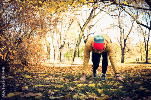Young man start run . Autumn season. © liderina