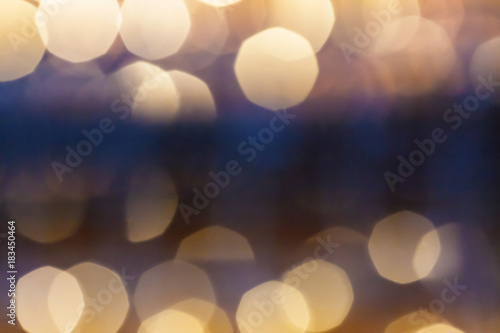 Shiny golden bokeh Christmas holiday background