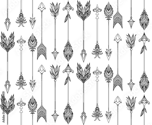 Seamless texture with boho arrows with different tips and plumage. Vector doodle pattern for your creativity