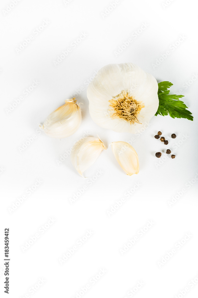 Garlic and herbs isolated on white background, top view Garlic and herbs isolated on white background, top view