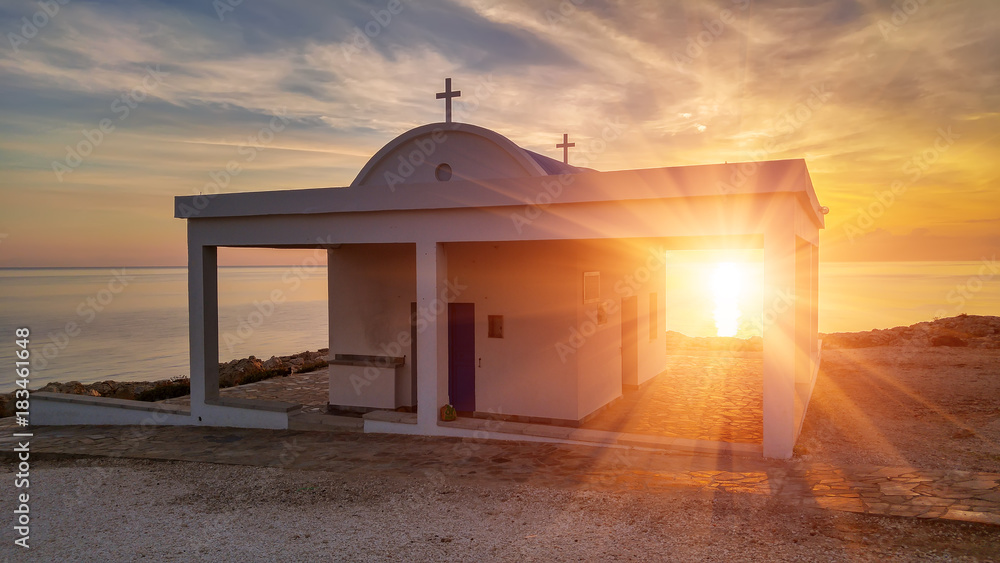 Cyprus, Mediterranean Sea coast. Agioi Anargyroi church at Cape Greco at sunrise