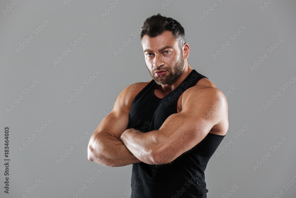 Portrait of a serious strong male bodybuilder