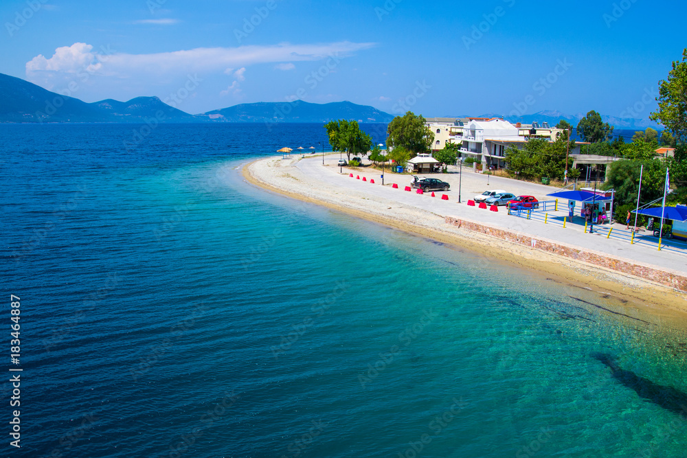 Pefki, Evia island, Greece July 25, 2014: The coast where the ferry is located at Pefki town in Evia island.