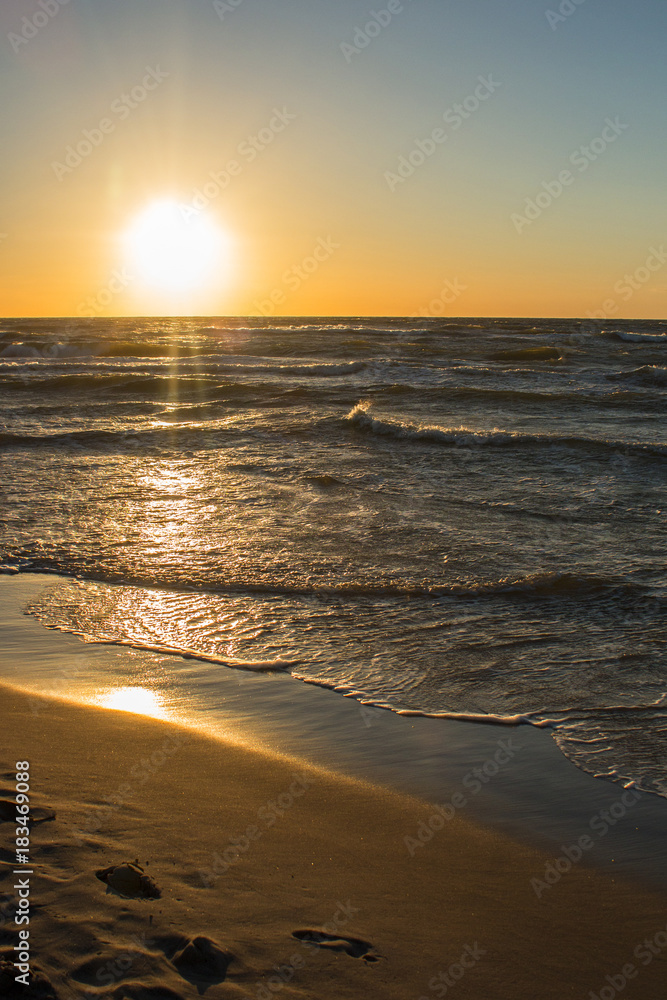 Fototapeta premium romantic sunset on the sea shore,