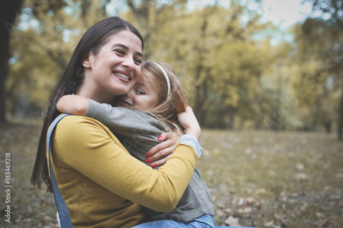 Mother and daughter share love.