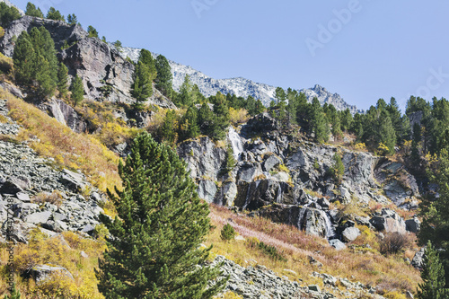 Small waterfall. Altai mountains landscape. photo