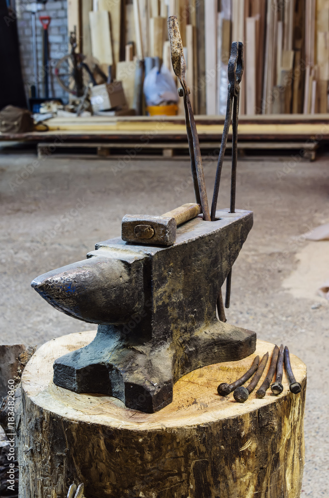 Iron anvil and blacksmith's tools / The picture is taken in the production room