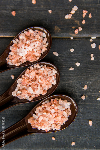 Studio shot of three spoons of pink himalayan salt