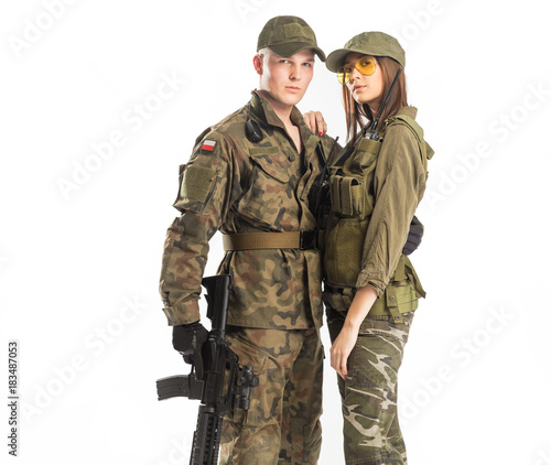 Obraz na plátně Man and woman in soldier's suit on white background