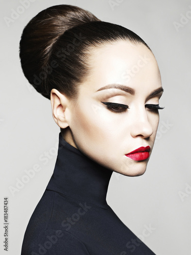 Beautiful elegant woman in black turtleneck