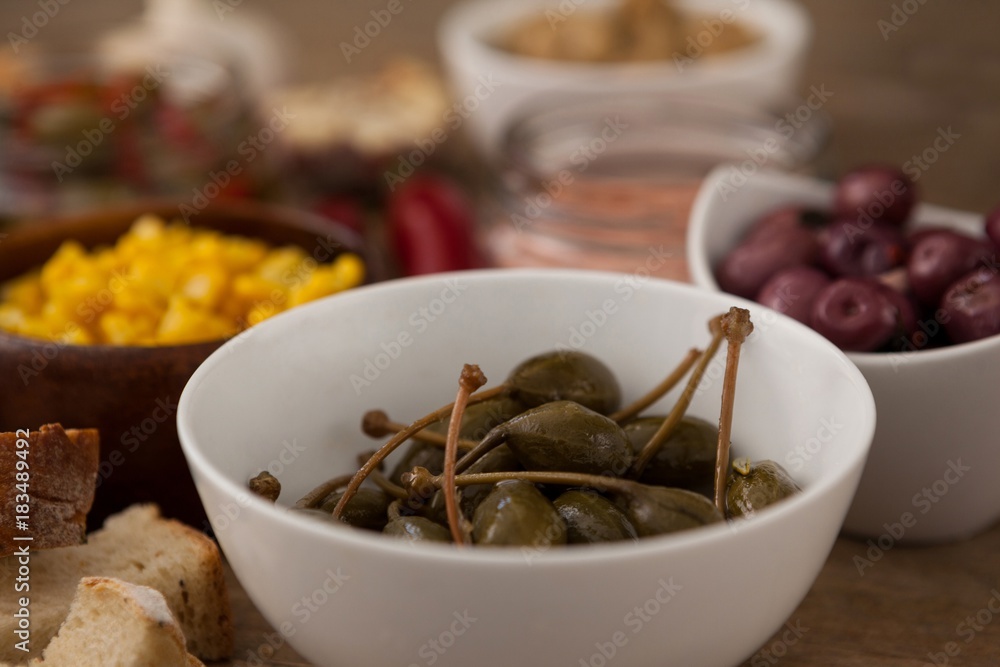 Close up of begetable in bowl by ingredients Close up of begetable in bowl by ingredients