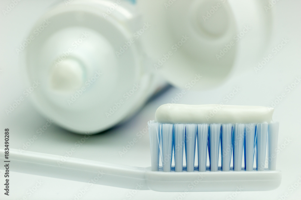 Close up Toothbrush and toothpaste tube on a white background. Suitable for dental health articles or Use a campaign for children to brush their teeth. Close up Toothbrush and toothpaste tube on a white background. Suitable for dental health articles or Use a campaign for children to brush their teeth.