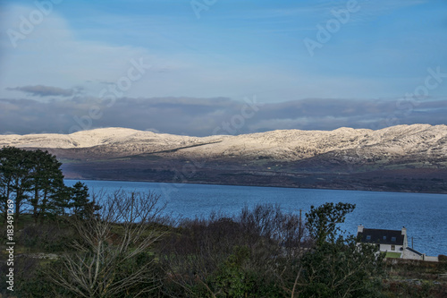 Snow capped hillside.