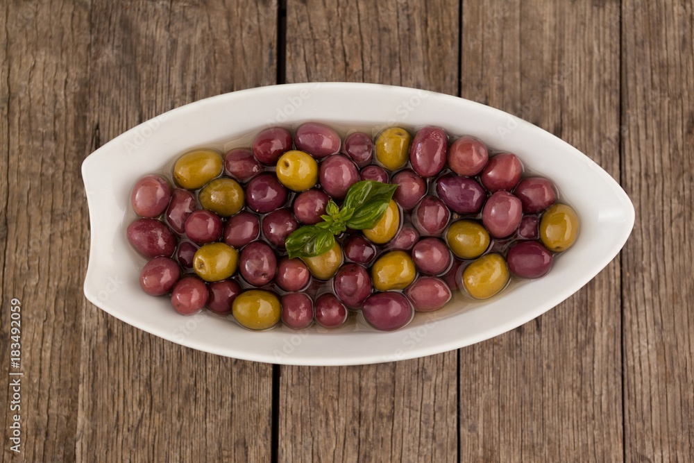 Overhead view of olives in plate Overhead view of olives in plate