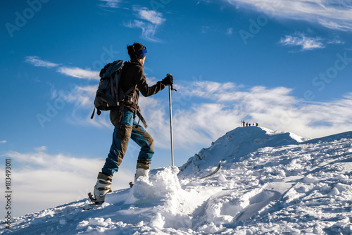 Ski mountaineering in mountains photo