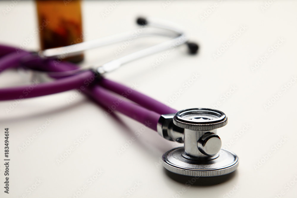 Closeup of a medical stethoscope, isolated on white background Closeup of a medical stethoscope, isolated on white background
