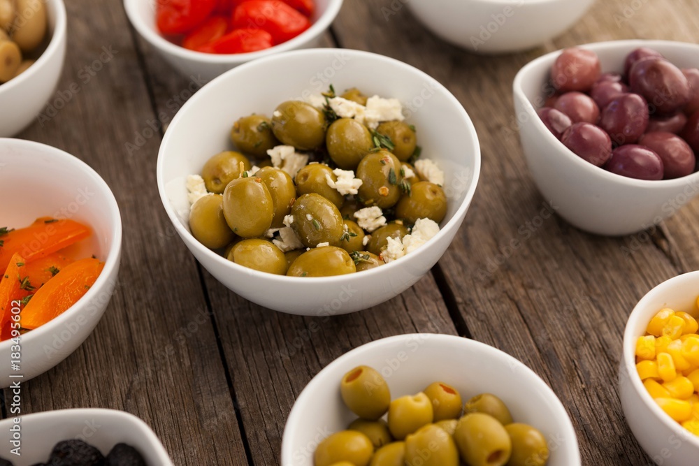 Various olives and ingredients in bowls Various olives and ingredients in bowls