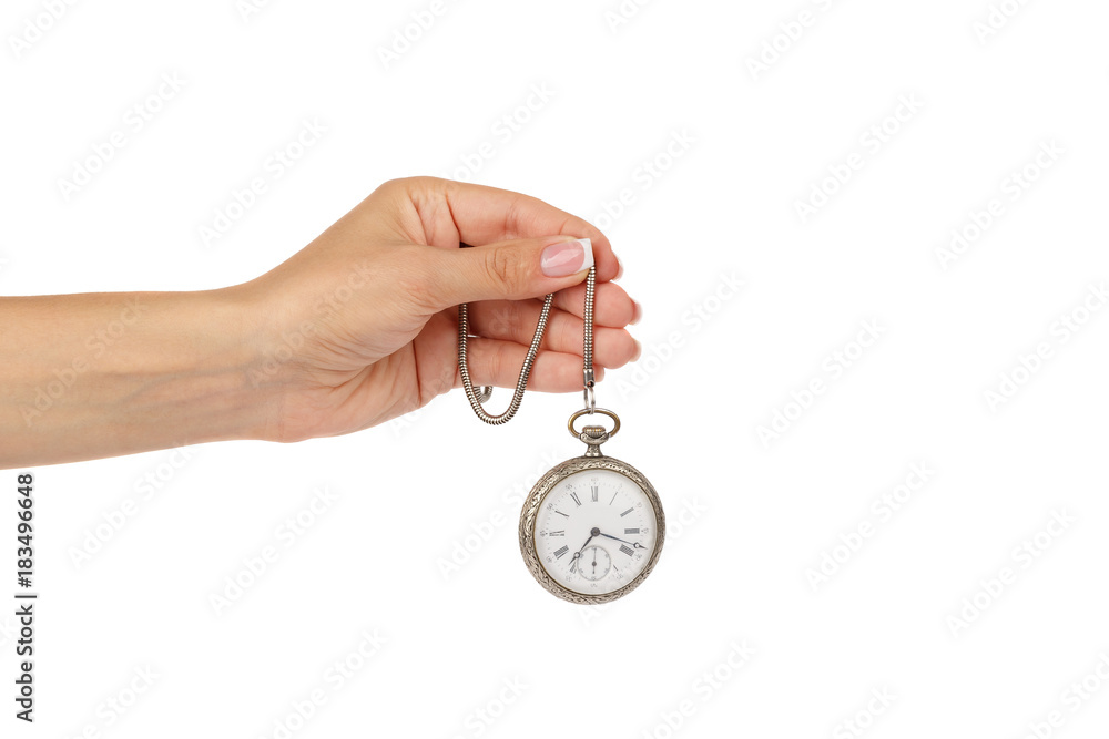 Hand of woman holds pocket clock, isolated Hand of woman holds pocket clock, isolated
