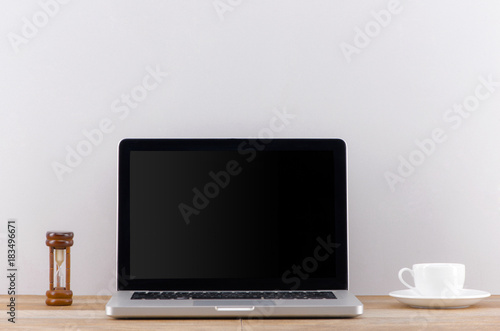 laptop computer white blank screen on work table front view